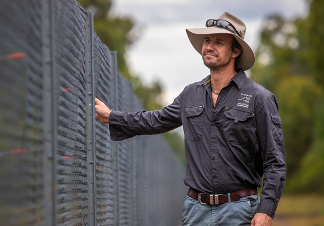 Wayne Sparrow, AWC Regional Operations Manager (North-east) at the Pilliga fence line.